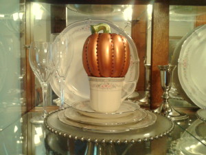 Classic Jeweled Pumpkin on display in china cabinet