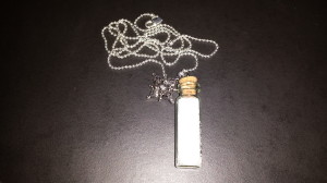 Snow-filled bottle necklace